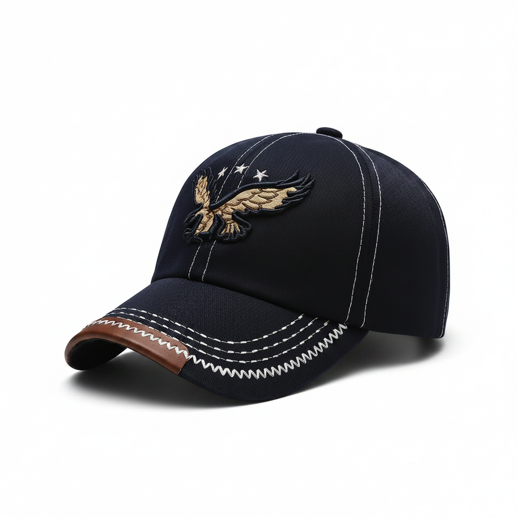 Navy blue cap with embroidered eagle design on a white background